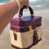Vanity bag Liana en raphia naturel et en cuir bordeaux